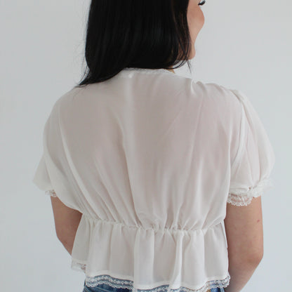 the muse drape top